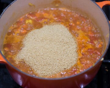 Couscous added to boiling broth.
