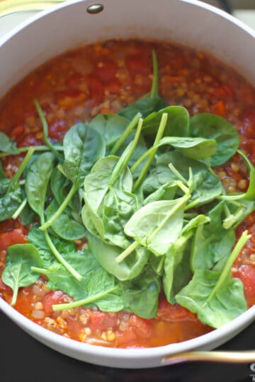 Spinach added to the pot.