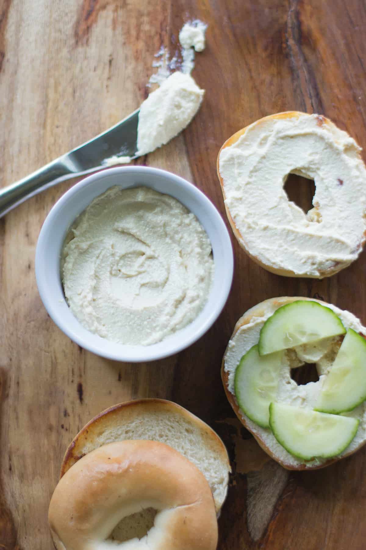 Tofu cream cheese in a small bowl and spread on toasted bagel with cream cheese.