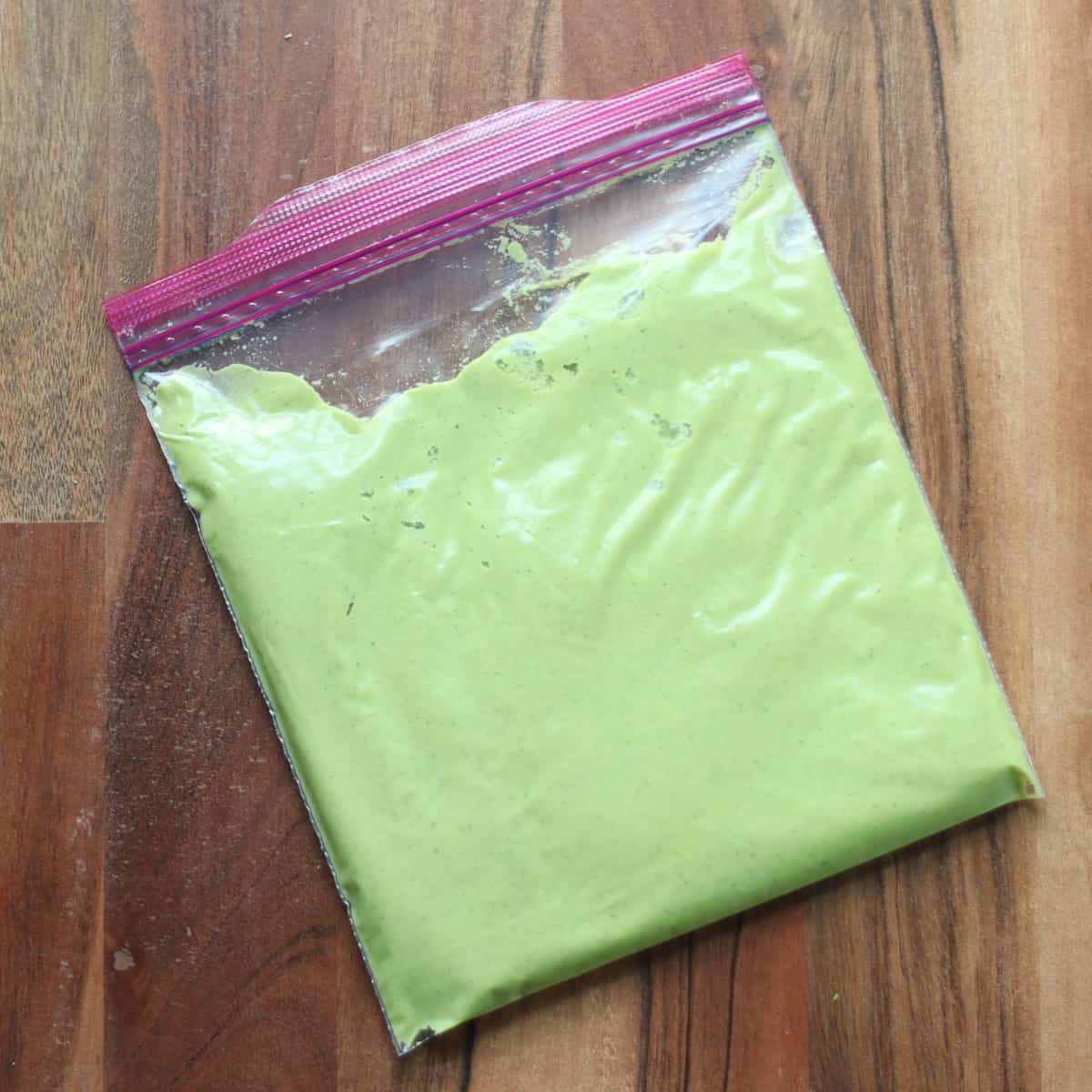 Leftover pesto in a freezer-safe bag.