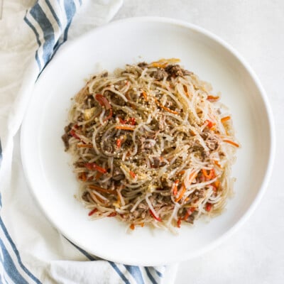 a close up shot of the plate baby-friendly japchae on a white plate