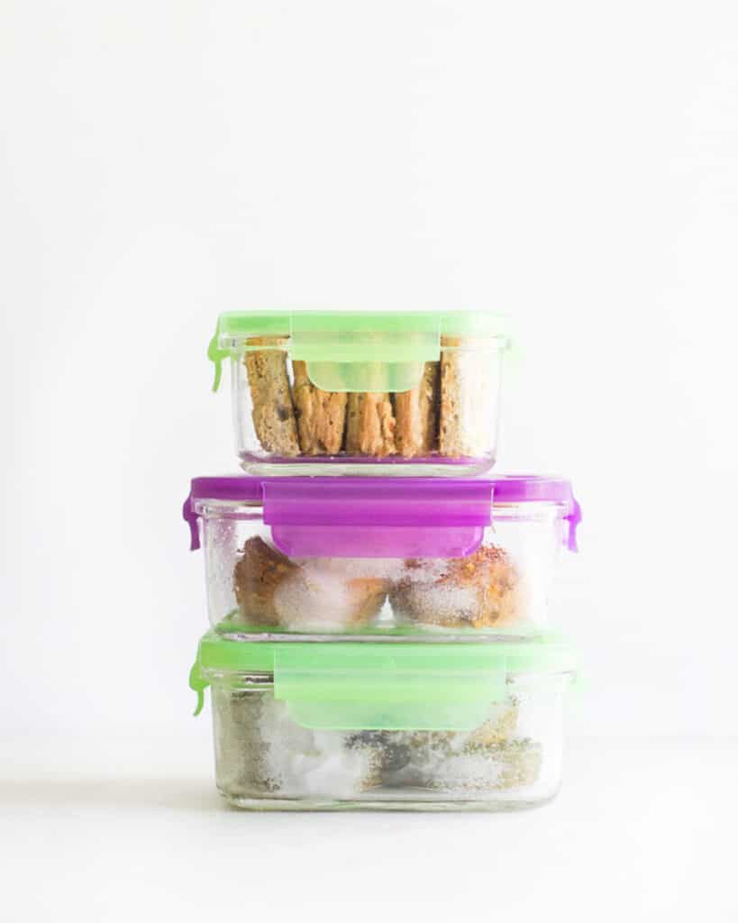 baked goods stored in 3 glass containers with a lid stacked on top of each other