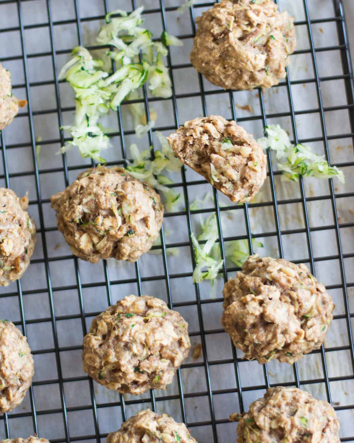 baked cookies on a wire rack with shredded zucchini