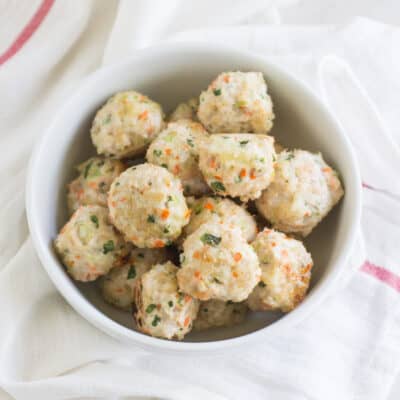 baked turkey rice meatballs in a deep white bowl