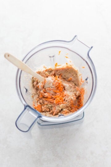 Carrots and walnuts stirred into batter.
