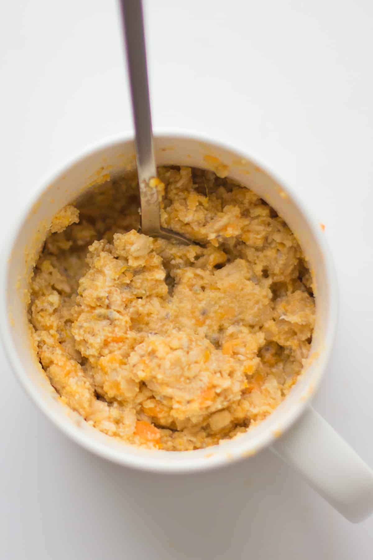 a close up shot of what microwaved sweet potato oatmeal looks like.
