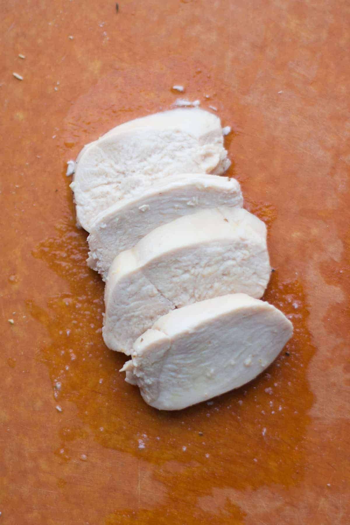 a close up shot of poached chicken.