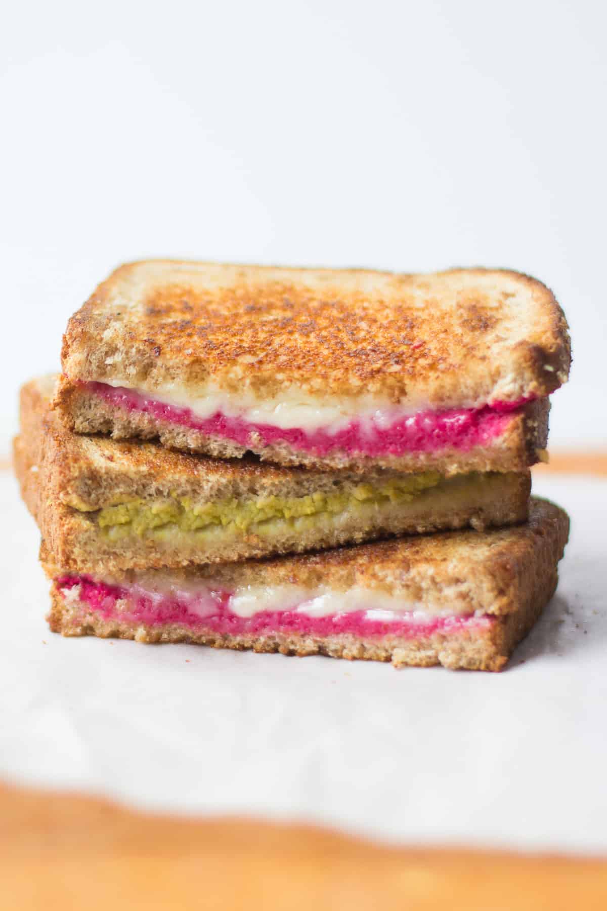 three stacked hummus grilled cheese.