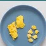 scrambled eggs cut into strips for 6 month old and bite sized pieces for 8 plus month old baby.
