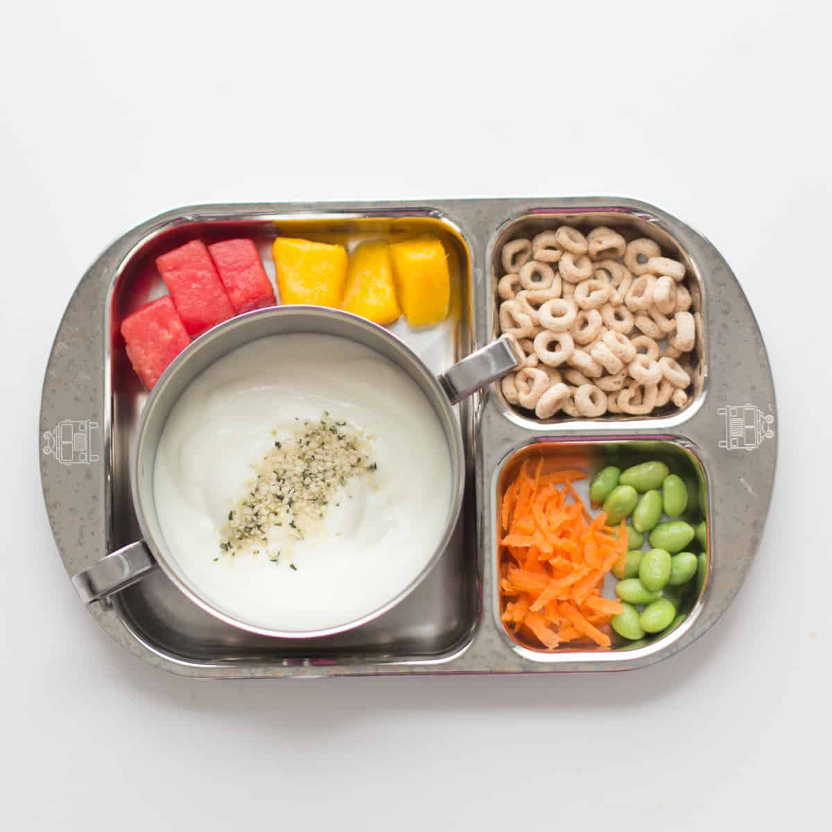 Yogurt buffet served in a stainless steel bowl and tray.