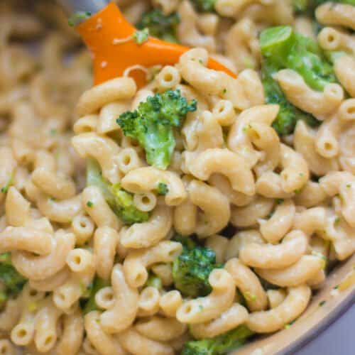 A close up shot of scooped broccoli pasta.