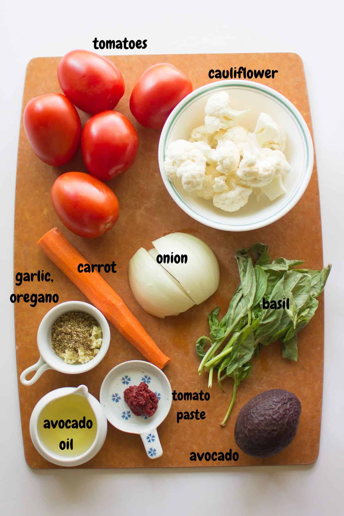 All the ingredients laid out on a wooden board.