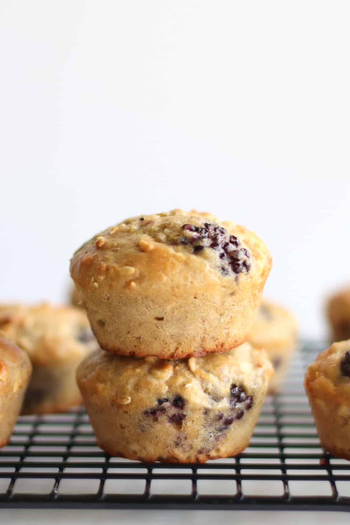 A close up shot of two stacked muffins.