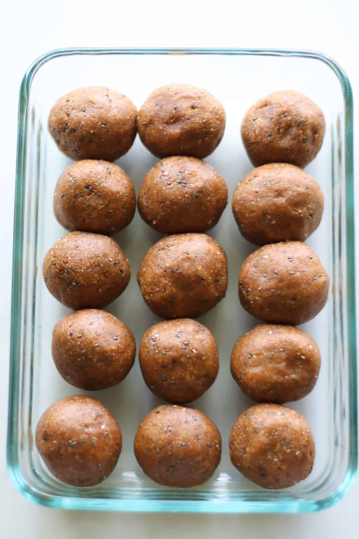 Shaped balls in a glass container.