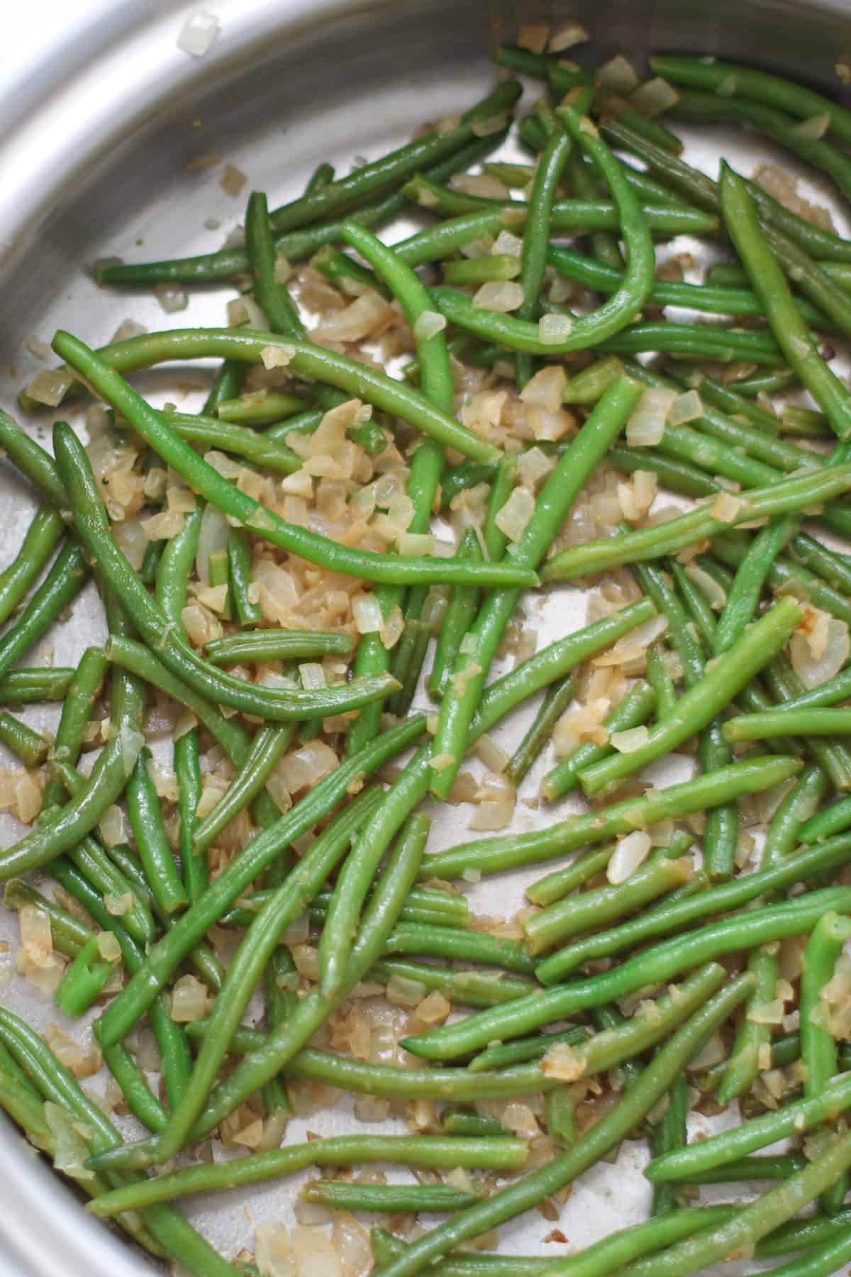 Sauteed green beans with onion and garlic.