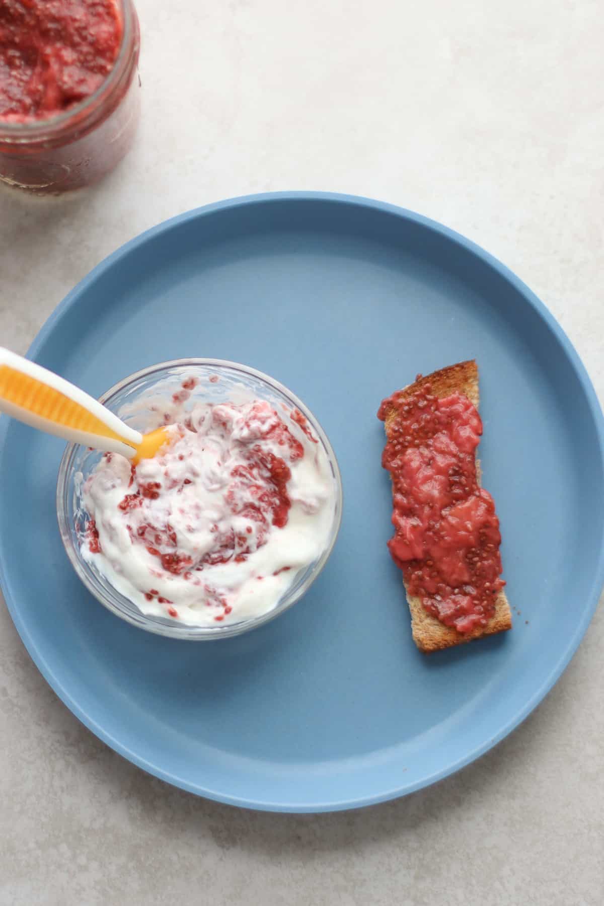 strawberry jam on toast strip and stirred into yogurt.