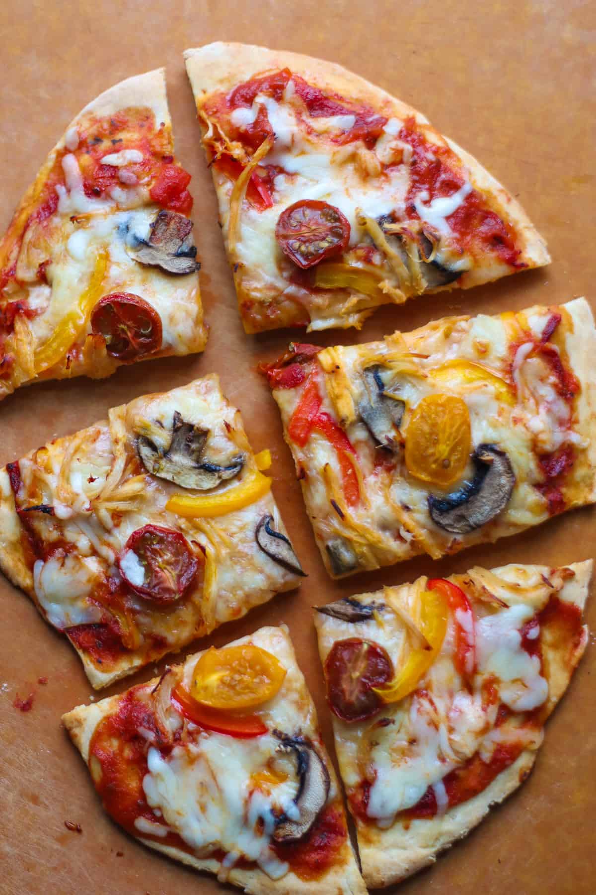 Baked protein pizza sliced into 6 pieces.