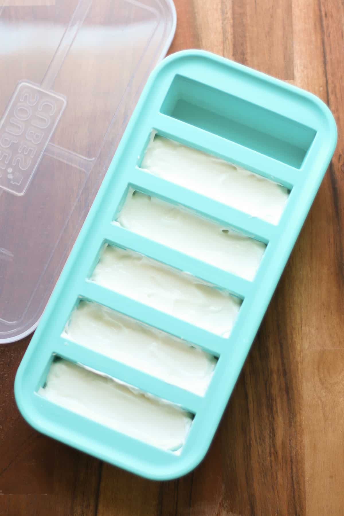 Yogurt in ½ cup freezer tray.