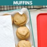 Muffins in glass container lined with paper towels.