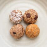 Four oatmeal balls with different add-ins.