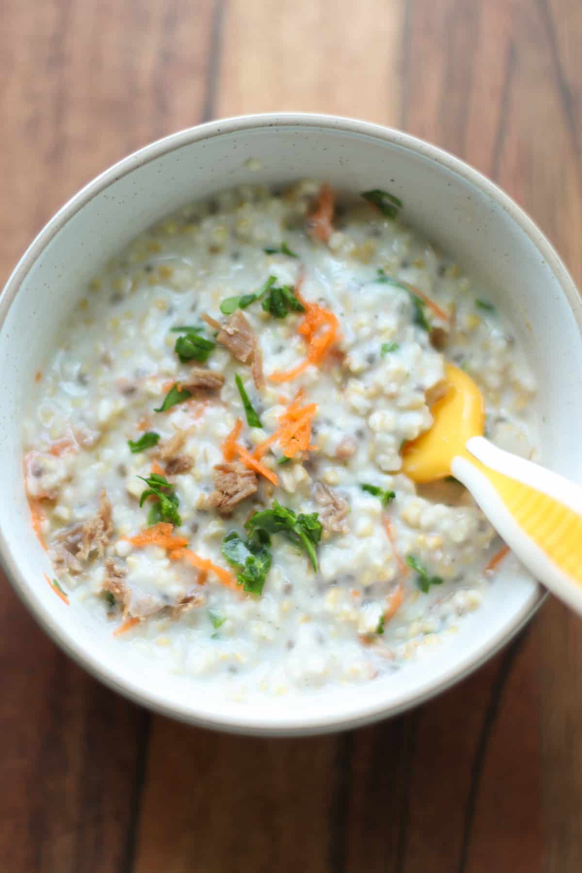 Savory overnight steel cut oats with carrots, spinach, and finely minced beef.