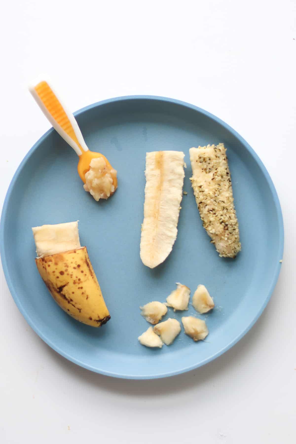 Banana with peel on, banana spears, mashed, and cut into bite-sized pieces.
