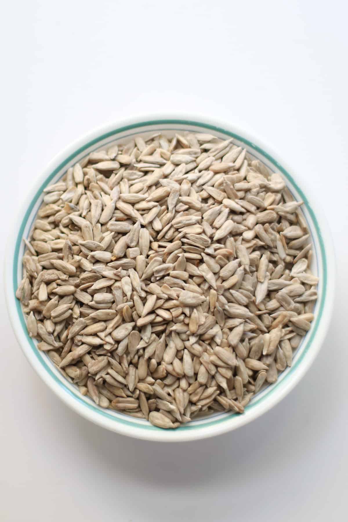 Sunflower seeds in a bowl.