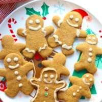 Baked and decorated gingerbread cookies on a festive plate.