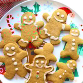 Baked and decorated gingerbread cookies on a festive plate.
