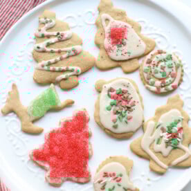 Decorated healthy sugar cookies on a white plate.