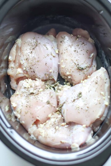 Chicken thighs in slow cooker.
