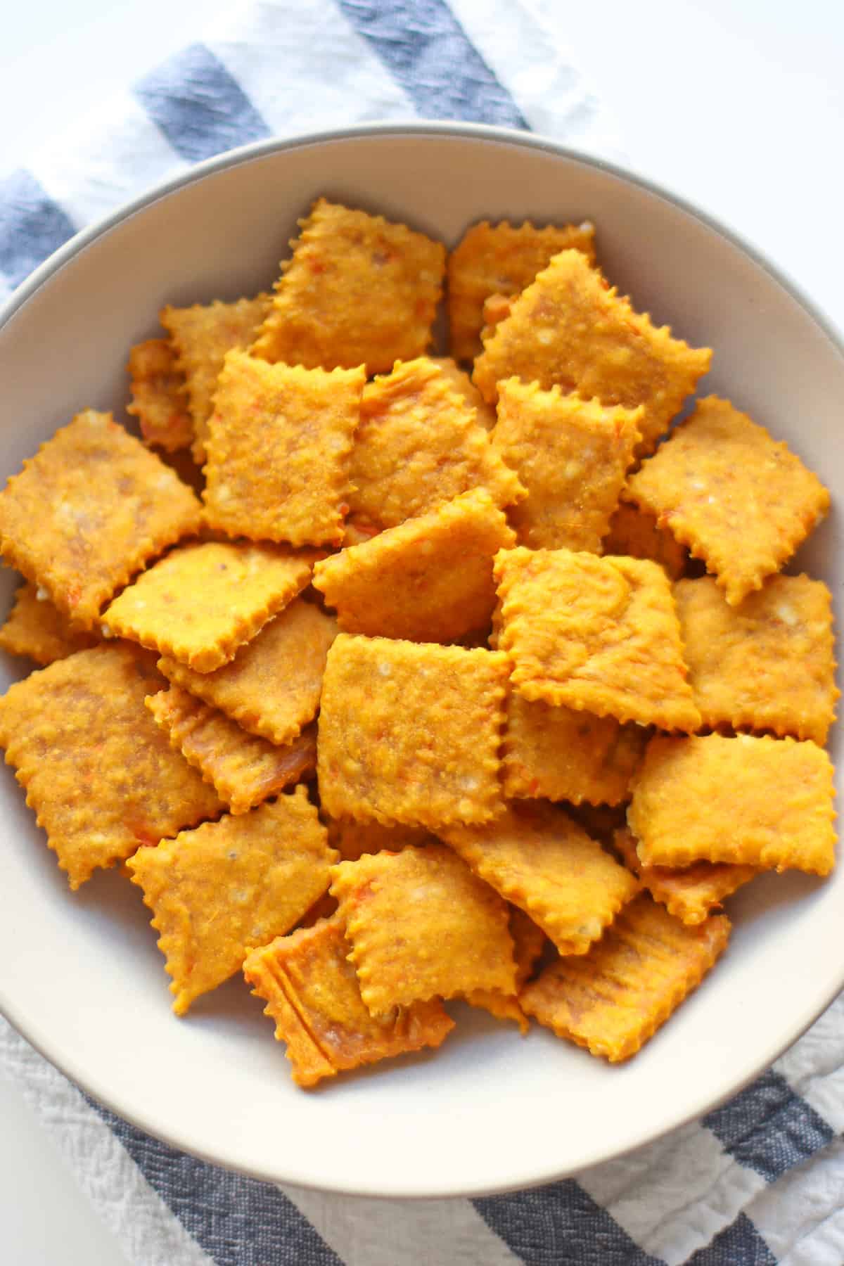 A bowl of baked cheese crackers.