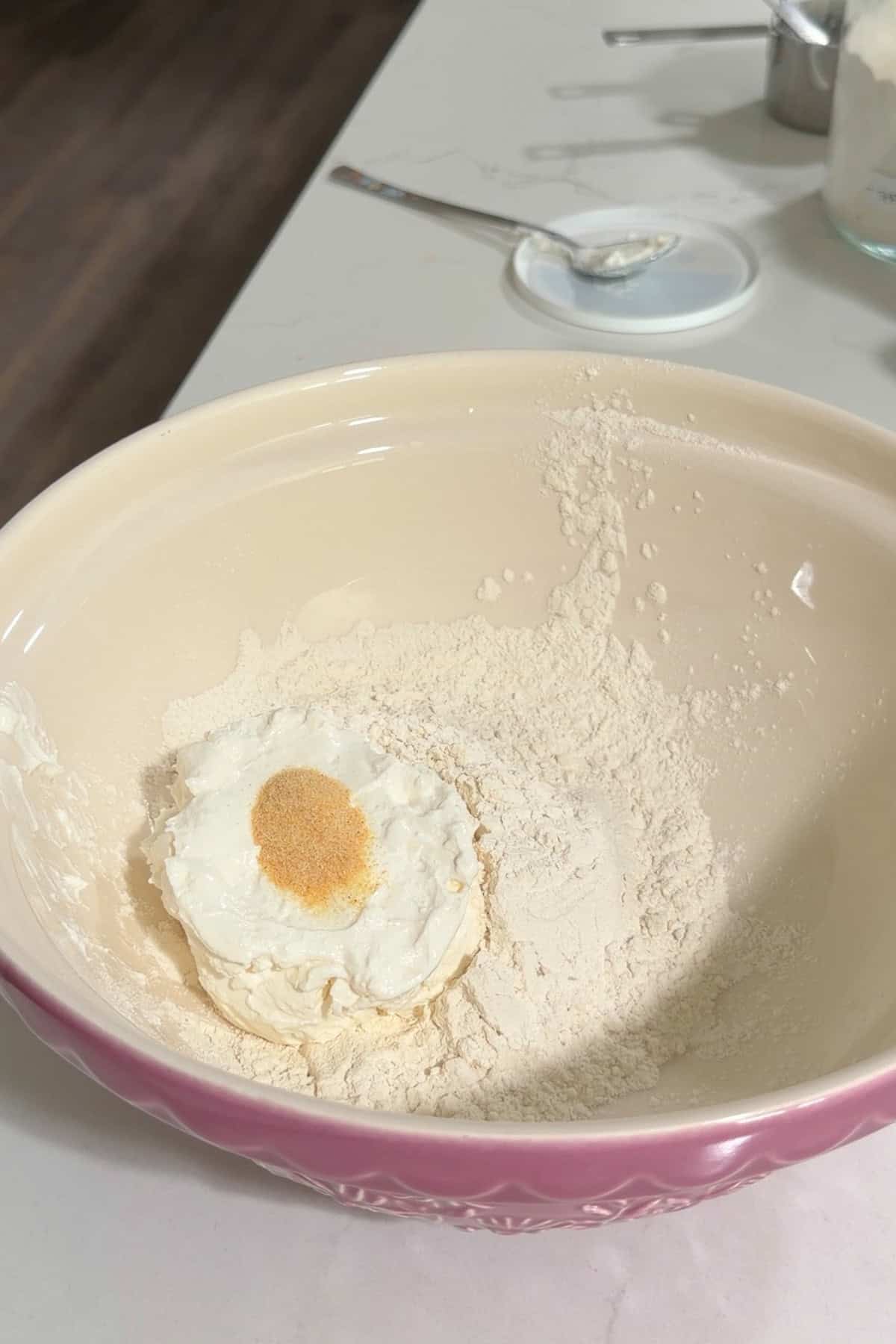 Flour, Greek yogurt, and garlic powder in a large bowl.