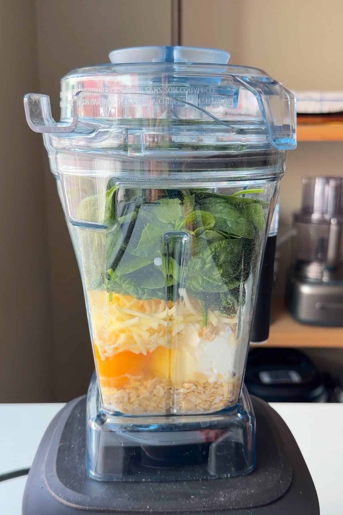 All the ingredients added to a blender.