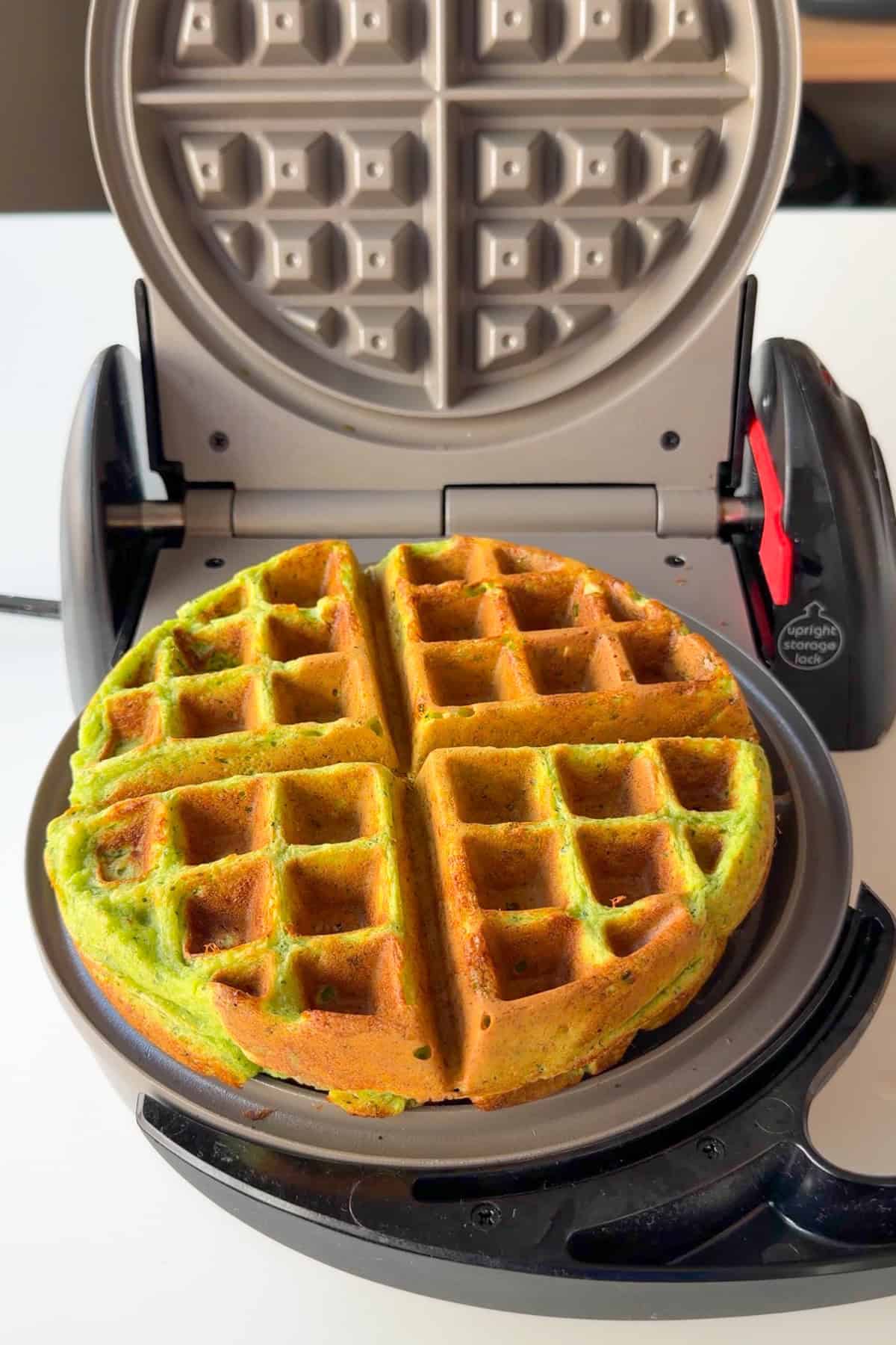 Savory waffle cooked in a waffle maker.
