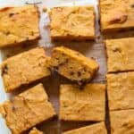 Sliced sweet potato blondies on a parchment paper.
