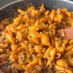 Creamy cottage cheese pasta with pumpkin in a large skillet.