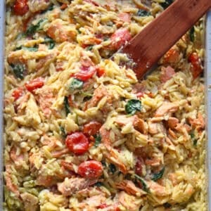 Cooked pesto salmon orzo bake.