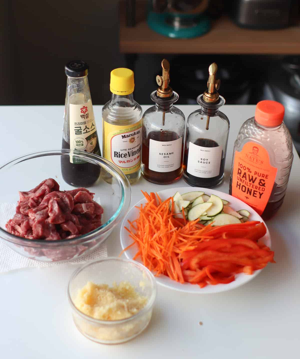 All the ingredients laid out on a white table.